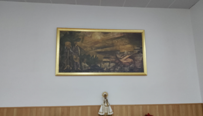 El mural ha sido sustituido por pintura blanca y una foto de la obra.